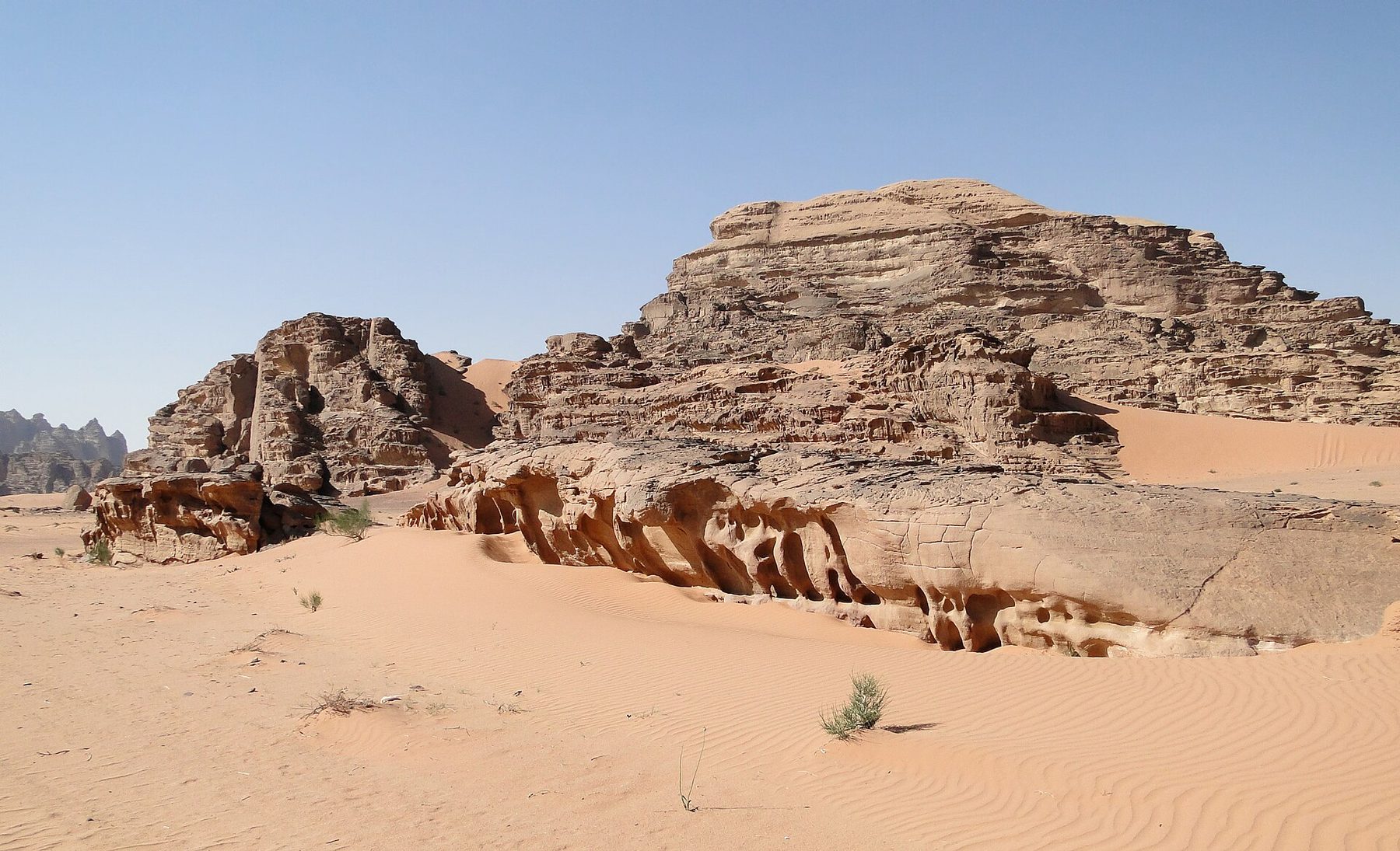Photograph of rock formations in Wadi Rum, Jordan. No Eden site or partnership is confirmed here.