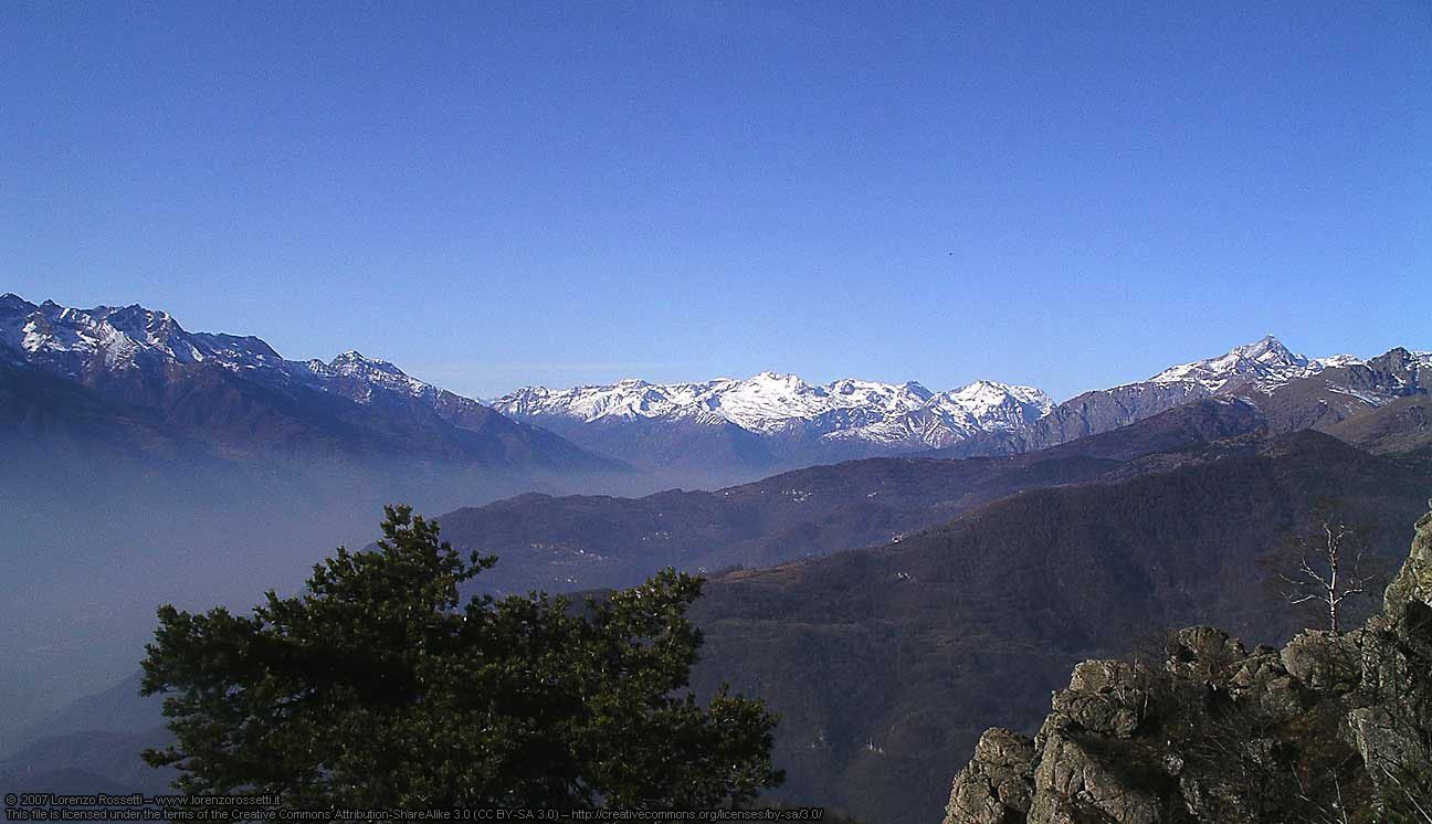 Photograph of the wider landscape: the Val di Susa with Rocciamelone and the Ambin group, Piedmont, Italy. Not the specific area under study. No Eden site or partnership is confirmed here.